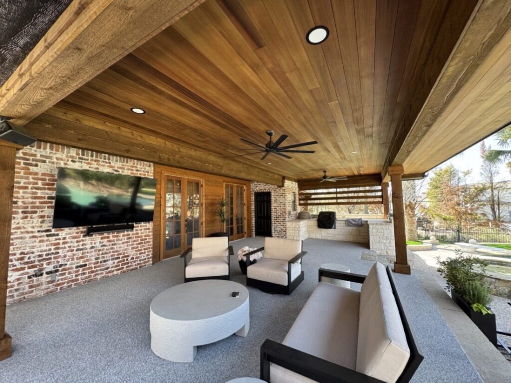 New custom build for outdoor living in Heath, Texas - patio cover, outdoor kitchen, custom wood work and stone work, plus raised beds, turf, and screens.
