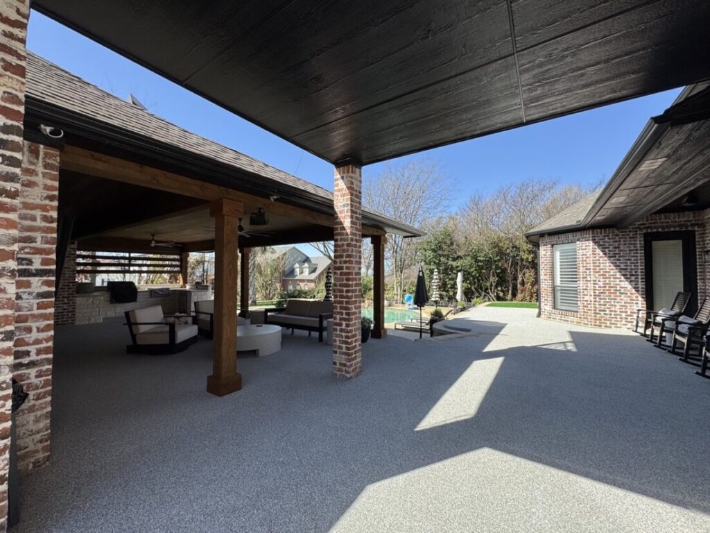 New custom build for outdoor living in Heath, Texas - patio cover, outdoor kitchen, custom wood work and stone work, plus raised beds, turf, and screens.