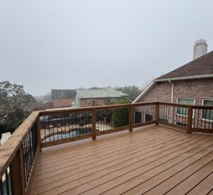 New back porch balcony and patio cover custom built in Rockwall by the experts in outdoor living in North Texas - Buildometry!