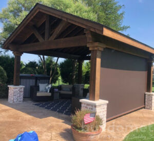 Outdoor living space screens by Buildometry - north Texas builder
