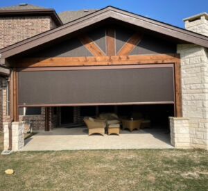 Outdoor living space screens by Buildometry - north Texas builder