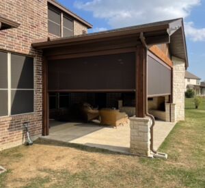 Outdoor living space screens by Buildometry - north Texas builder