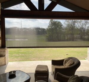 Outdoor living space screens by Buildometry - north Texas builder