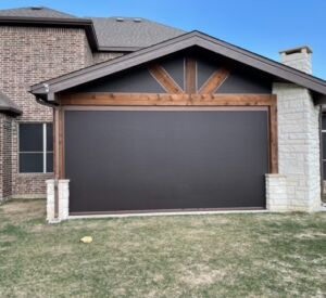 Outdoor living space screens by Buildometry - north Texas builder