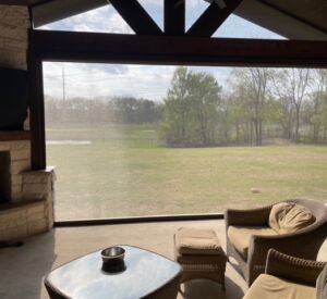 Outdoor living space screens by Buildometry - north Texas builder
