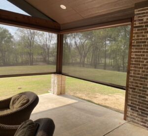 Outdoor living space screens by Buildometry - north Texas builder