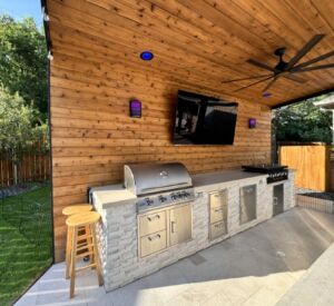 New outdoor kitchen and bar custom built by Buildometry in North Texas