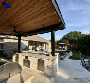 New outdoor kitchen and bar custom built by Buildometry in North Texas