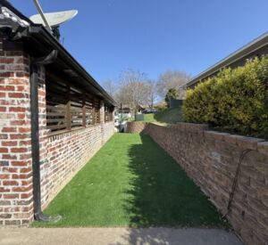 New custom build for outdoor living in Heath, Texas - patio cover, outdoor kitchen, custom wood work and stone work, plus raised beds, turf, and screens.