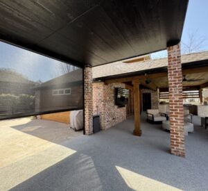 New custom build for outdoor living in Heath, Texas - patio cover, outdoor kitchen, custom wood work and stone work, plus raised beds, turf, and screens.