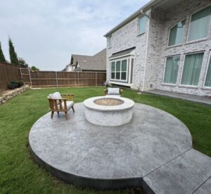 New Custom Outdoor Living Project in Rockwall, TX by the experts at Buildometry - custom stone and concrete fire pit