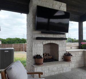 default backyard patio with built in fireplace and covered patio