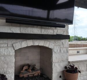 default backyard patio with built in fireplace and covered patio
