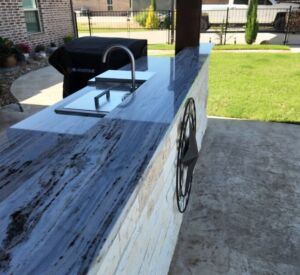 outdoor kitchen with marble countertop